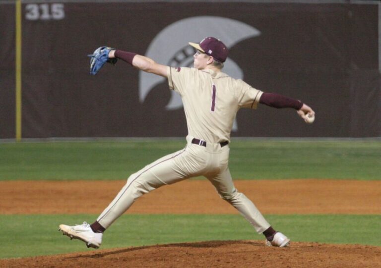 Junior pitcher/first baseman Michael Strickland, seen here against Richmond Hill last week, improved to 3-0 with a 0.00 ERA after the Trojans' 8-6 win over Vidalia. Strickland also had two hits and two RBI.