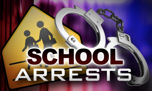 School system police arrest two individuals for allegedly vandalizing the freshman campus